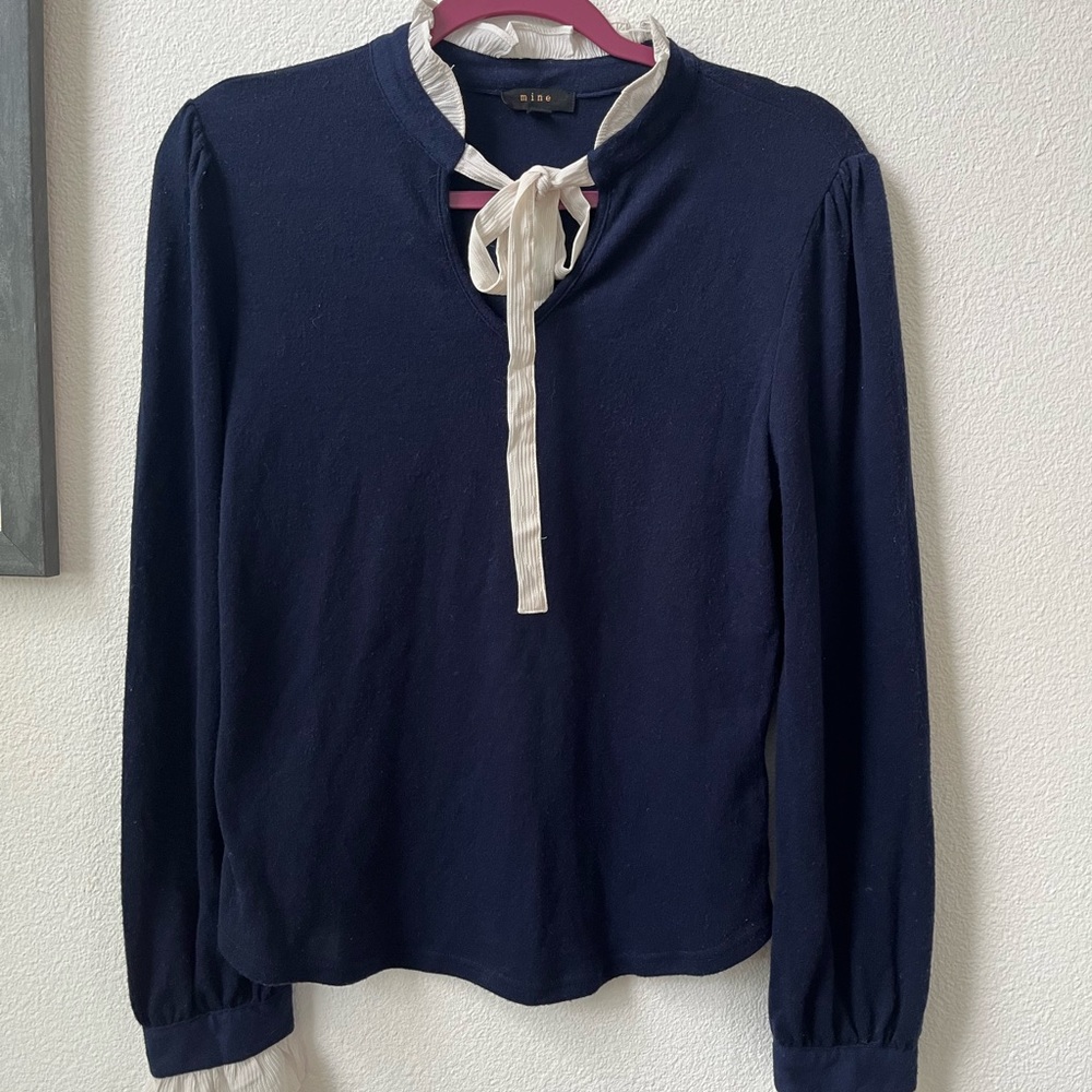 Mine. Navy sweater with ruffles. Size medium.